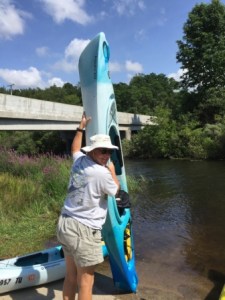 Emptying Claire's Kayak of water