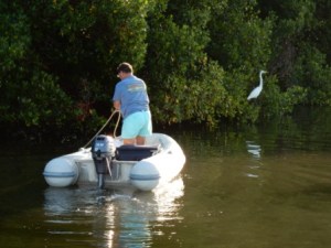 Mark retrieving the tied-off stern line
