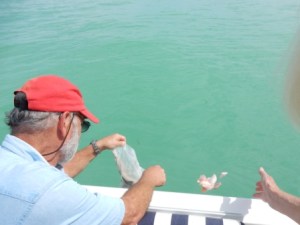 Jeff releasing the ashes and Carol flower Petals