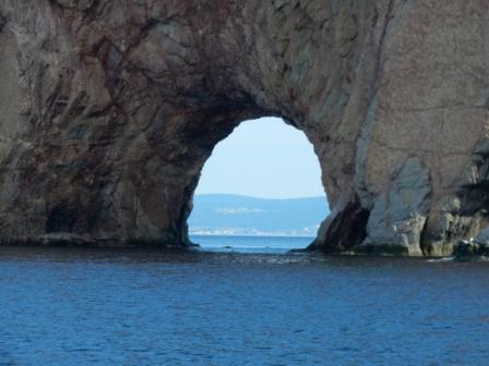 Hole in Percé Rock from back side
