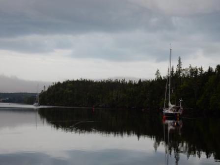 "Sea Quester" leaves - Sailboat at anchor