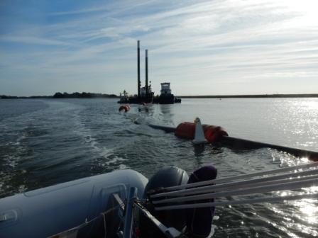 Close quarters passing McClellanville dredge